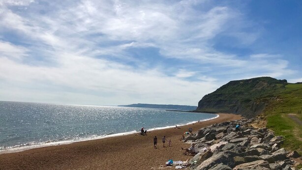 A beach with a rocky shoreline, a sandy beach, and a clear sky. - Apple Blossom - Chideock, Bridport (Chideock)