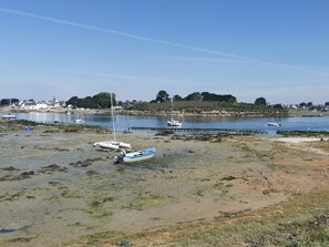 On the beach, sun-loungers