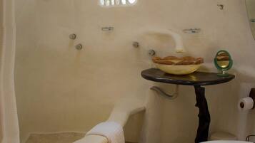 Shower, towels, soap, toilet paper