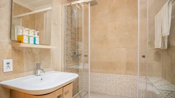 Shower, hair dryer, soap, shampoo