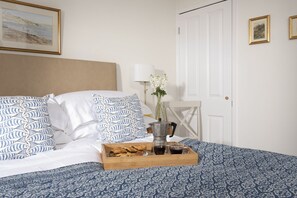 2 bedrooms, desk, iron/ironing board, travel cot