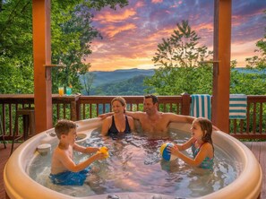 Bañera de hidromasaje al aire libre