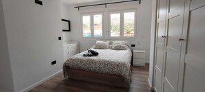 2 bedrooms, soundproofing, iron/ironing board, travel cot
