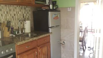 Microwave, coffee/tea maker, cookware/dishes/utensils