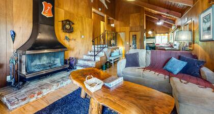 Classic cabin near the lake with stunning views, large deck, & wood fireplace