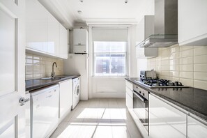 Fridge, microwave, oven, dishwasher - Spacious South Ken 2BR w/ Elevator, nr South Ken Station, by Blueground (London)