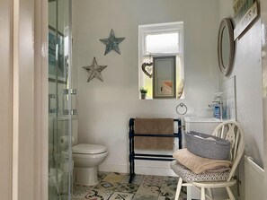 Shower, free toiletries, hair dryer, towels