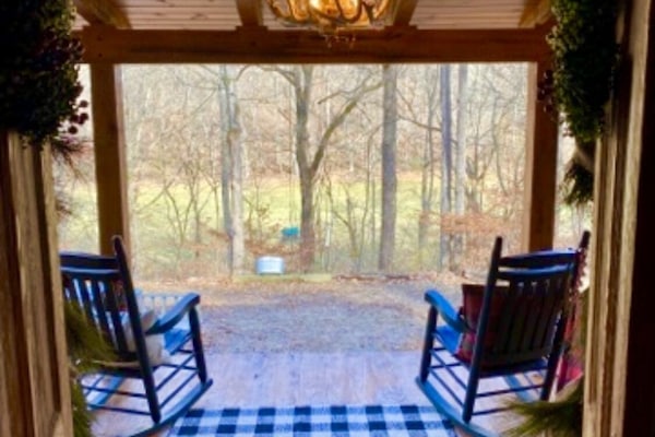 Front porch rockin’ in our Amish made chairs await your stay!