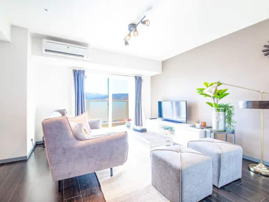 Apartment, Non Smoking | Living area | Flat-screen TV