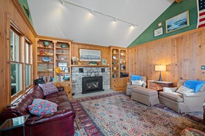 Smart TV, fireplace, books