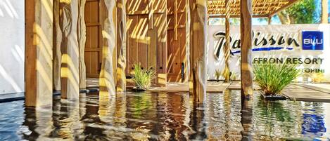 Seasonal outdoor pool, open 10:00 AM to 7:00 PM, pool umbrellas