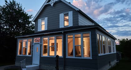 Walker’s Hidden Gem! Steps to Downtown Walker & Heartland Trail! Includes Garage