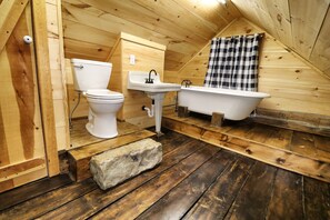Bathtub, hair dryer, towels, soap