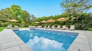 A heated pool - Newly Renovated, Modern home with pool, cathedral ceilings, open-floor... (Southampton)