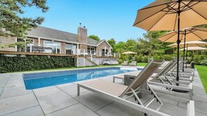 A heated pool - Newly Renovated, Modern home with pool, cathedral ceilings, open-floor... (Southampton)