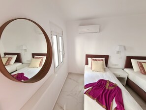 2 chambres, coffre-fort, système d’insonorisation