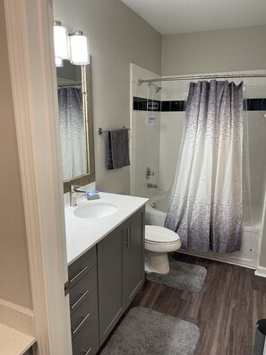 Combined shower/tub, towels, soap, toilet paper - 26th Street Hideaway!! (Atlanta)