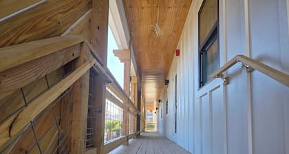 "48 Friends, One Epic Beach House! Huge Party Deck - Walk to Beach & Bars"