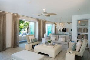 TV, books - Modern Luxury Beachfront Vacation Home - Footprints (Mount Standfast)