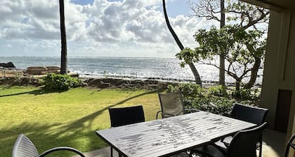 Amazing views from this ground floor, corner unit steps from the beach!