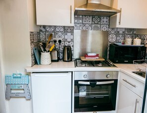 Fridge, microwave, oven, stovetop - Painter`s Cottage, a charming cottage in historic Town of Matlock Bath (Derbyshire)
