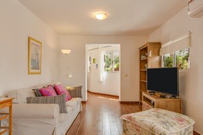 Televisión, reproductor de DVD y estéreo 