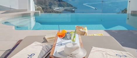 2 outdoor pools, pool umbrellas, pool loungers