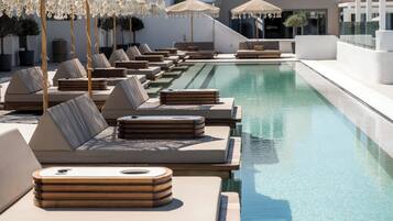 2 outdoor pools, pool umbrellas, pool loungers
