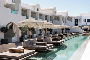 Seasonal outdoor pool, pool umbrellas, sun loungers