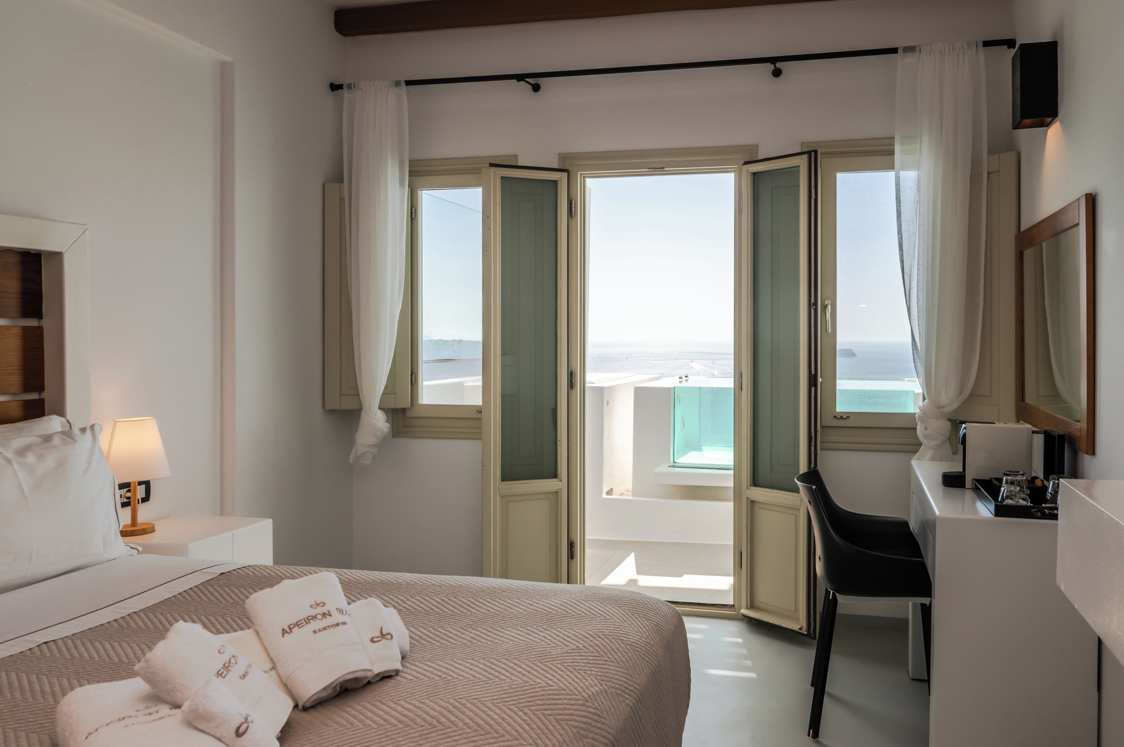 sunset crystal suite with hot tub and caldera view | 1 bedroom, premium bedding, minibar, in-room safe