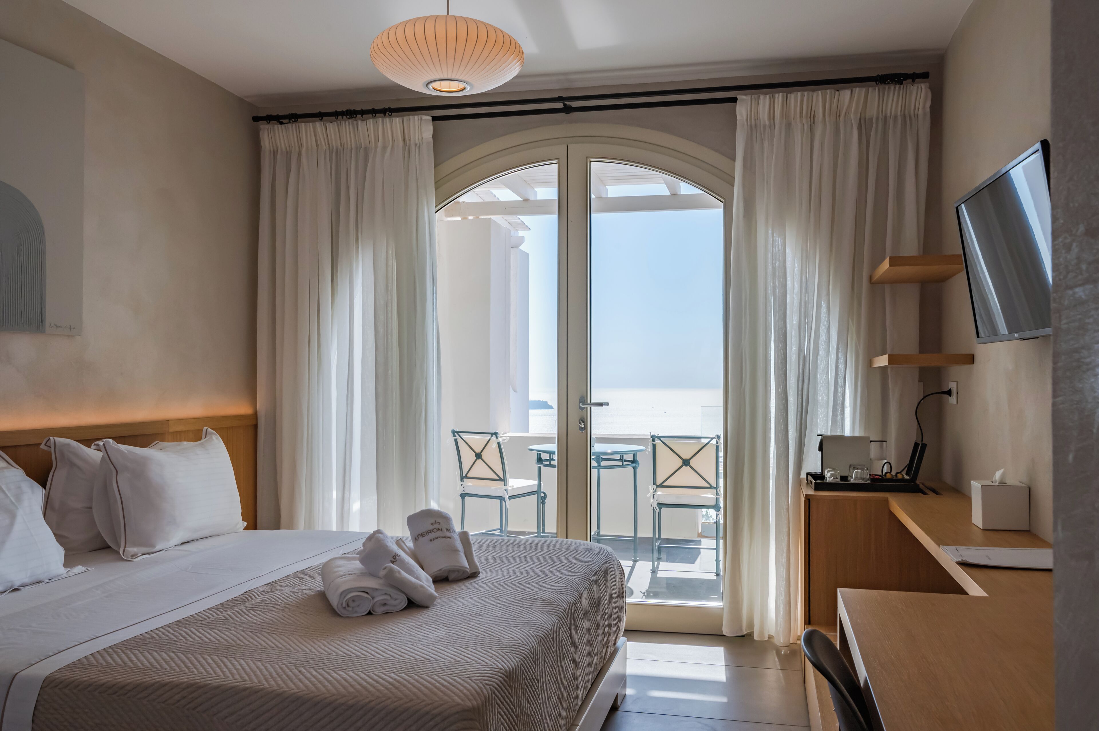 double room with caldera view | 1 bedroom, premium bedding, minibar, in-room safe