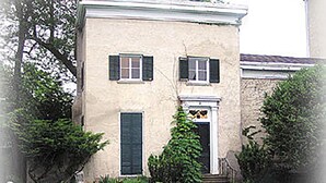 A two-story building with a pool in front. - Book all 4 units in this National Historic Landmark in the Village of Geneseo (Geneseo)