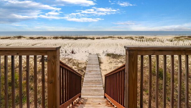 A wooden boardwalk leading to a beach with dunes and a clear sky. - CABANA DEL SOL IS A 2BD/2BA GULF FRONT W/AMAZING VIEWS, 2 SCREEN PORCHES! (Port Saint Joe)