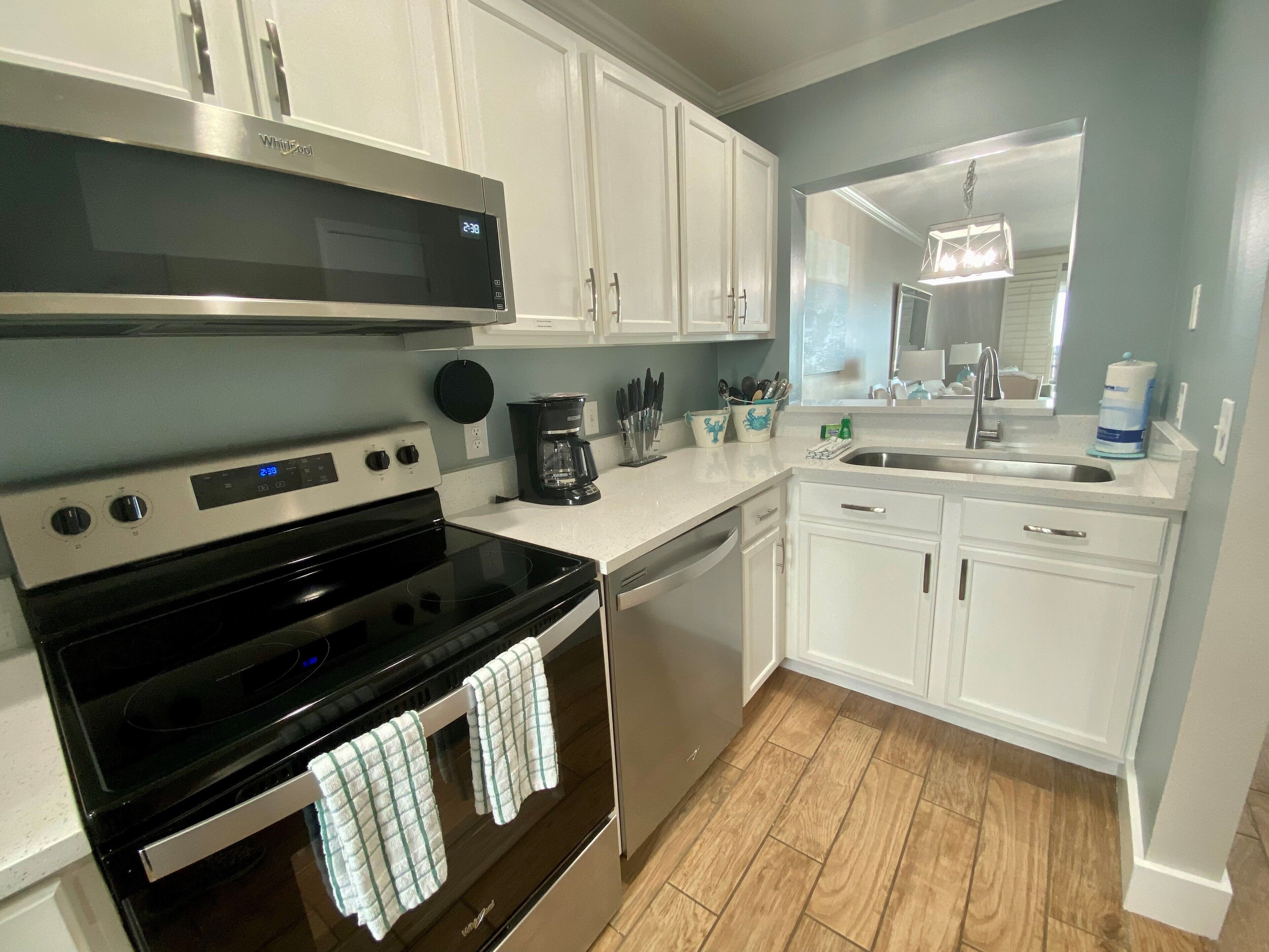 Microwave, coffee/tea maker, toaster, cookware/dishes/utensils