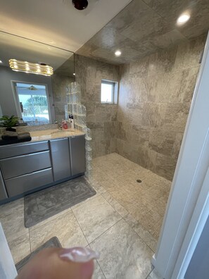 Bathtub, hair dryer, towels
