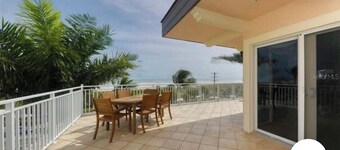 Beach front paradise located in a Condo Building Beach front Penthouse!