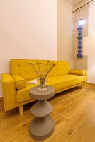 Deluxe Double or Twin Room | Living area | Flat-screen TV