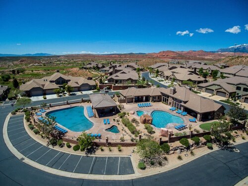 Two heated pools/spas, pond, backyard w/ BBQ