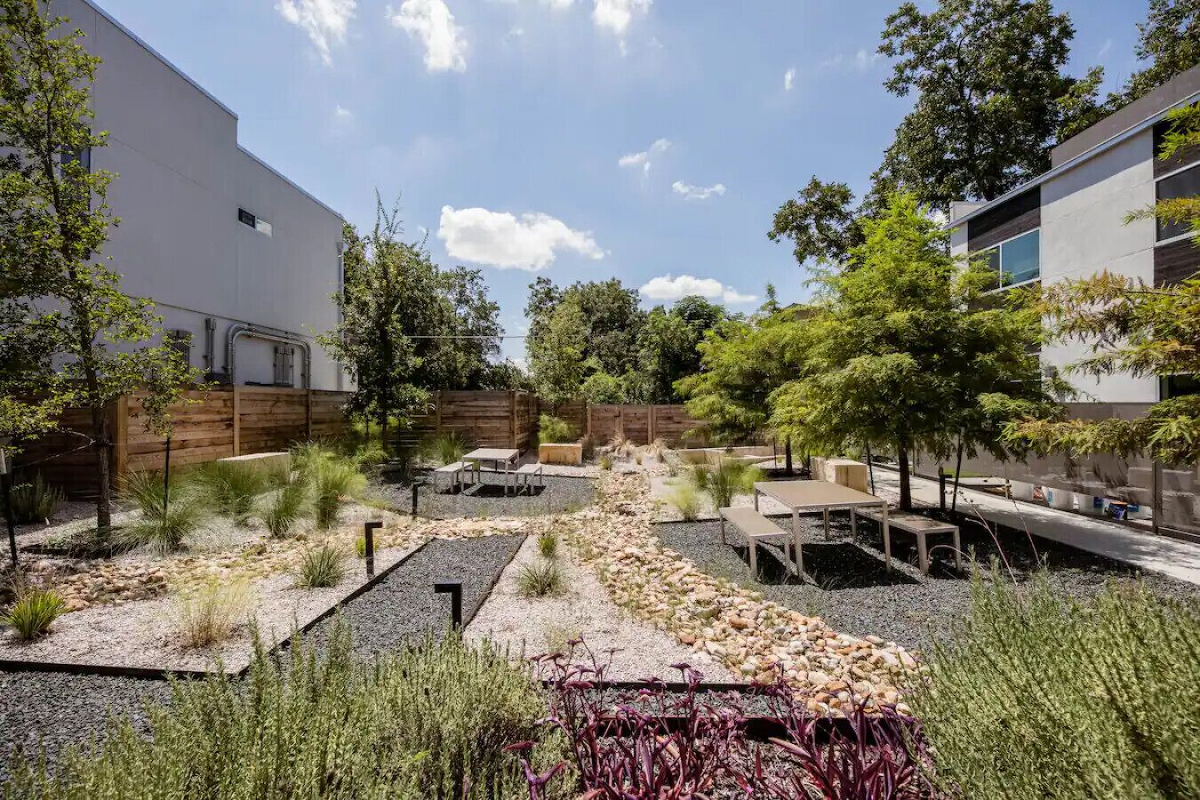 Shared courtyard with tables for hanging out or working outside.