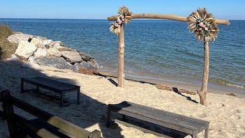 On the beach, sun-loungers, beach towels