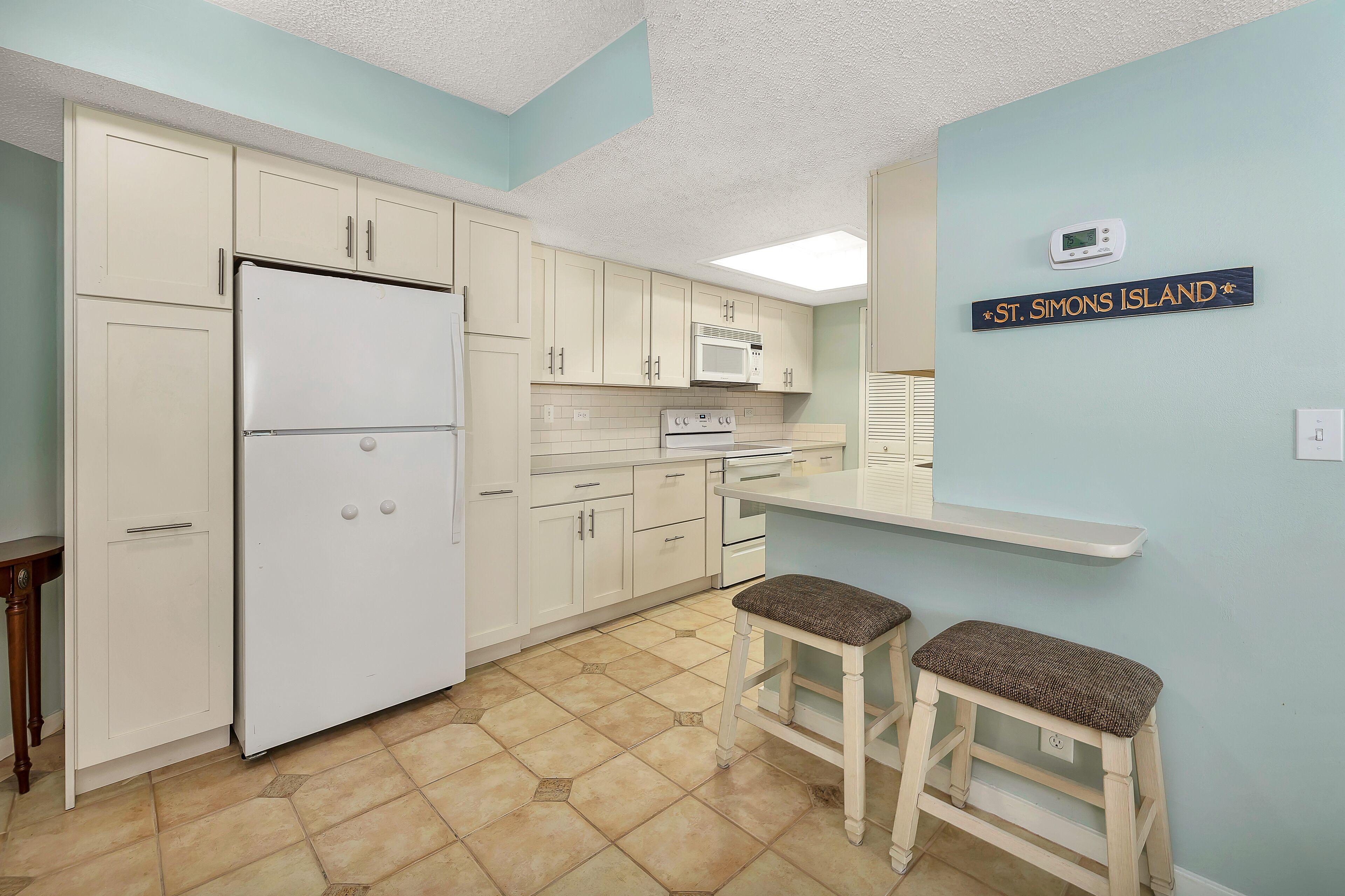 Beachfront Condominium with Courtyard View! Amenities Include Pool, Tennis and Fitness Ctr