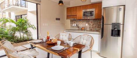 Fridge, microwave, stovetop, coffee/tea maker