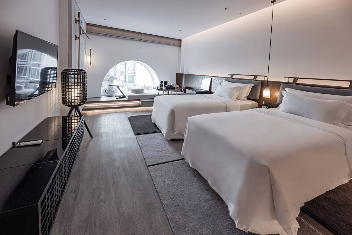 Premium bedding, down duvets, pillow-top beds, free minibar items