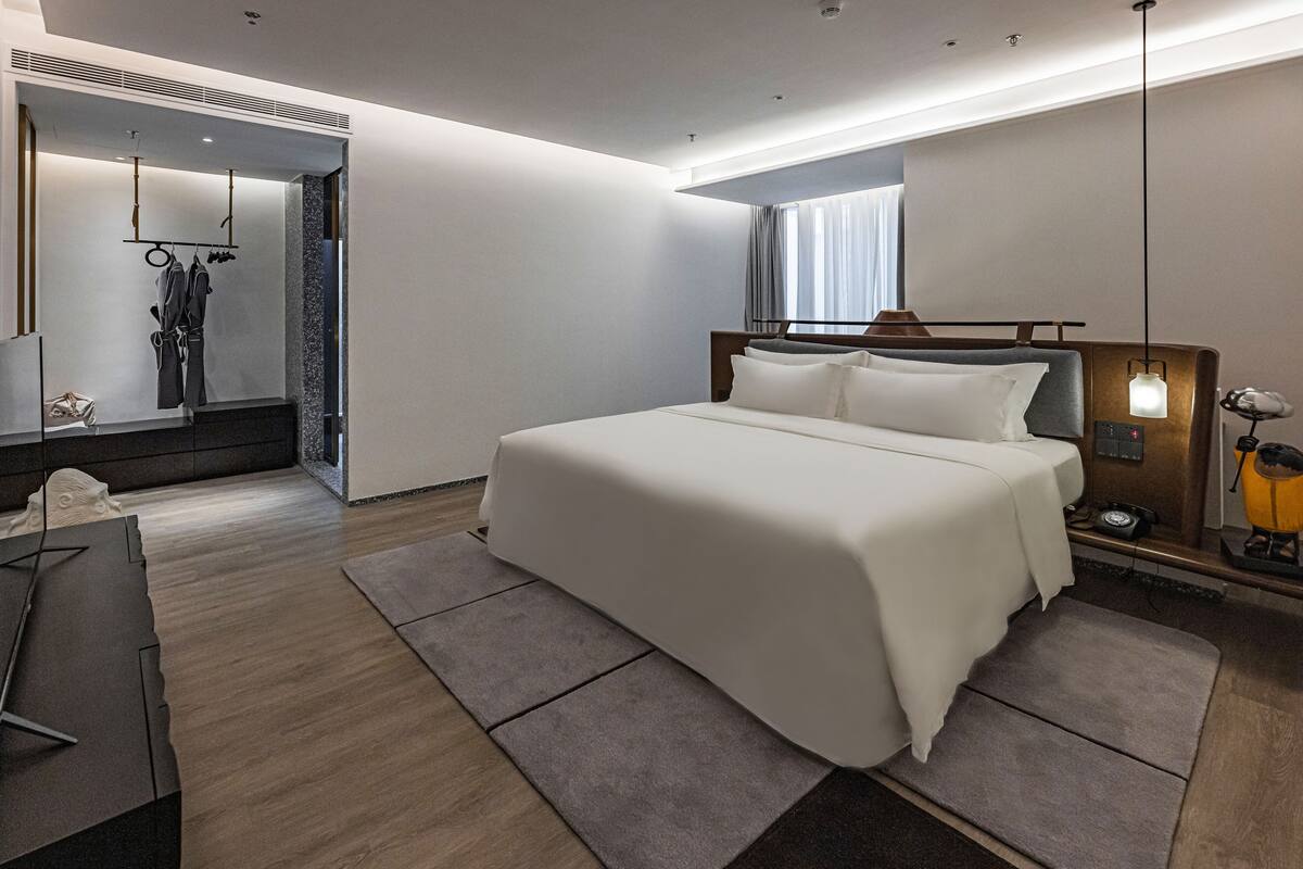 Premium bedding, down duvets, pillow-top beds, free minibar items