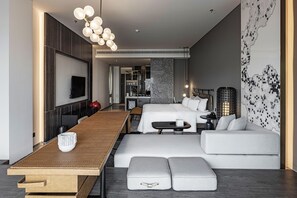 Premium bedding, down duvets, pillow-top beds, free minibar items