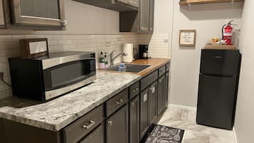 Fridge, microwave, coffee/tea maker, electric kettle