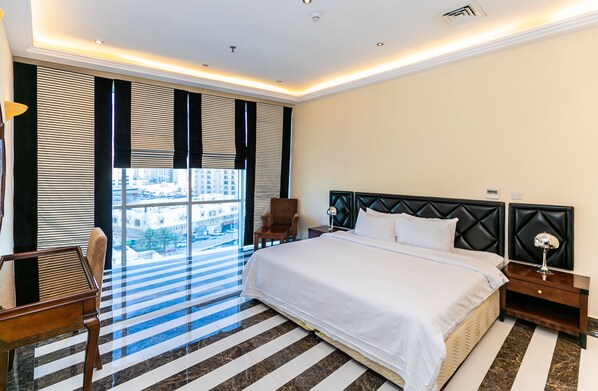 Premium bedding, pillow-top beds, in-room safe, desk