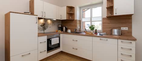 Fridge, oven, dishwasher, coffee/tea maker
