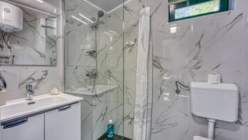 Family Studio, Mountain View, Mountainside (Honeymoon Suite Črni Kal) | Bathroom | Shower, hydromassage showerhead, hair dryer, towels