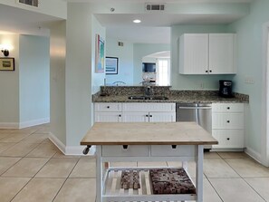 Fridge, microwave, oven, stovetop - Partial Beach View Condo w/ Spacious Balcony + Steps From Beach Access (Tybee Island)